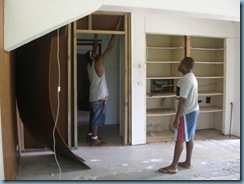 Job removing masonite walls