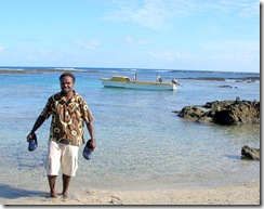 2007 JBI graduate John Nako in front of our 9 passenger boat!