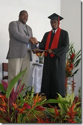 Principal Edgell Iolopua and graduate Job Dalili Emele