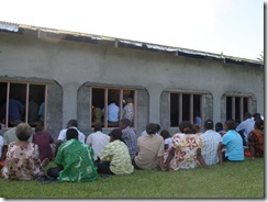 Sitting in the windows and outside