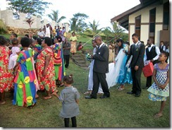 Bridal party walking to the wedding feast