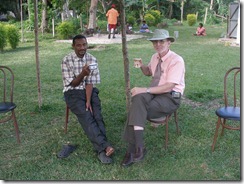 Pastor Sope and Gary have some coffee