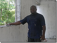 Pastor Peter Avock, 2007 JBI grad and tile layer