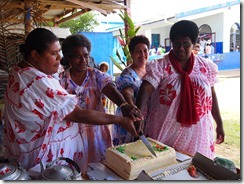 WM committee cutting cake
