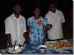 Jonah and Michel helping to serve with Faith Maimai