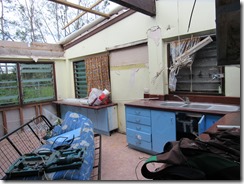 Cleaning out damaged kitchen